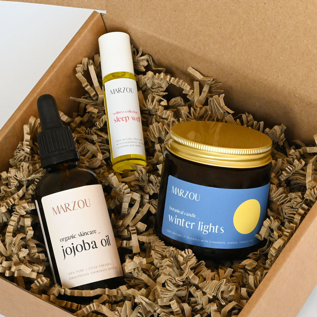 winter nights gift box jojoba oil candle sleep well roll-on